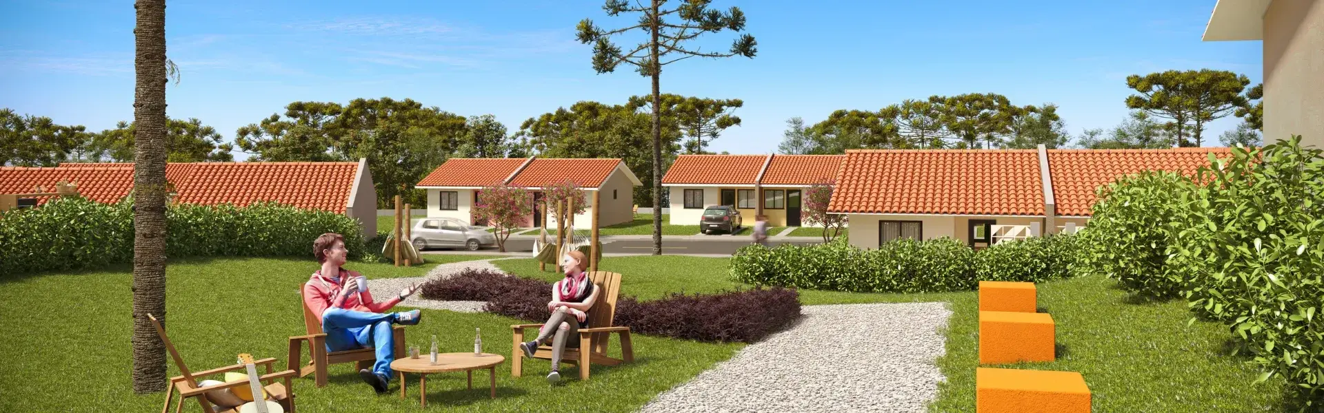 Área verde do condomínio com as casas ao fundo
