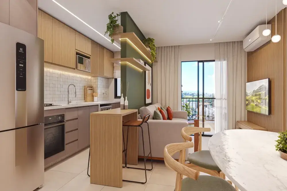 Sala integrada com a cozinha de um apartamento do VEGA Neoville